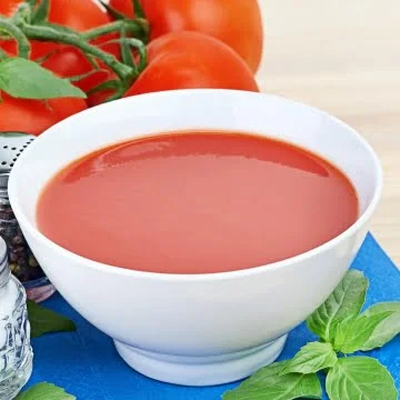 roma tomato soup served in a bowl
