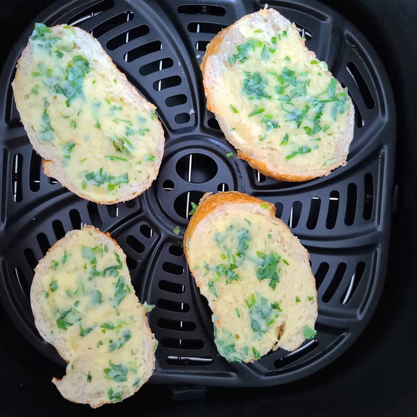 four bread sliced toast with garlic butter