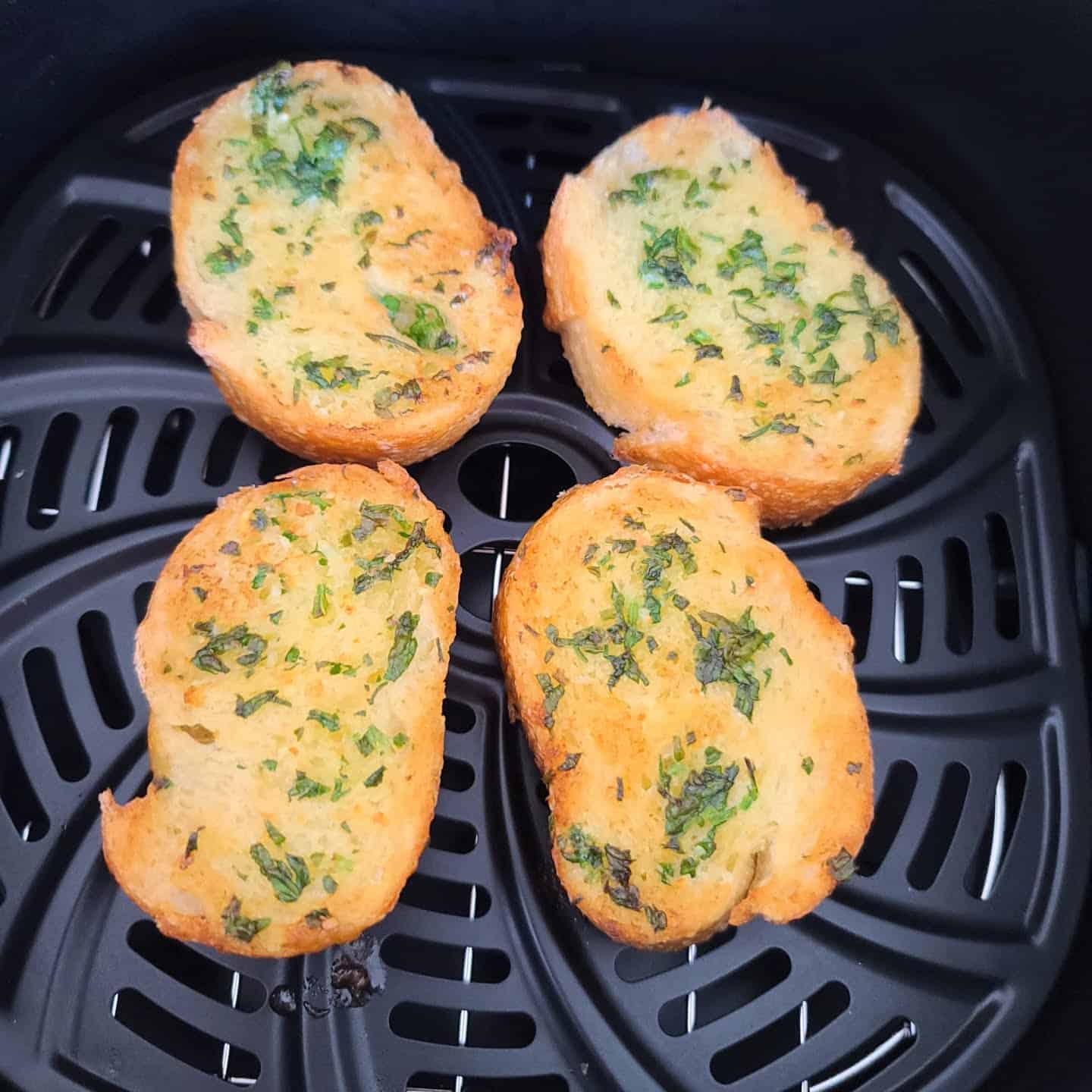 four bread sliced toast with garlic butter