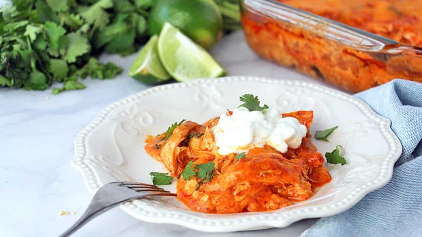 Chicken enchilada casserole  with sour cream on top 