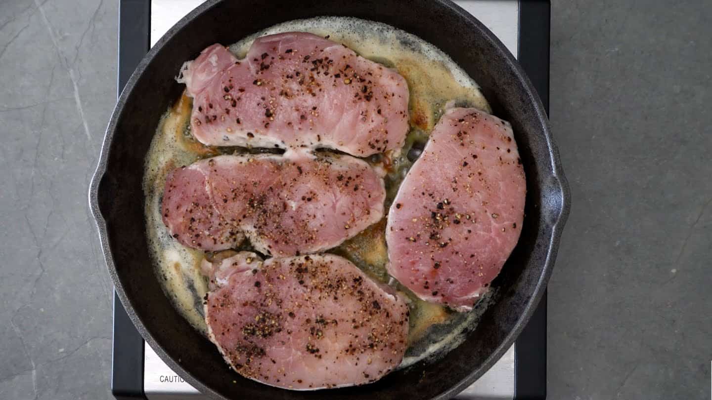 pork chops in the melted butter