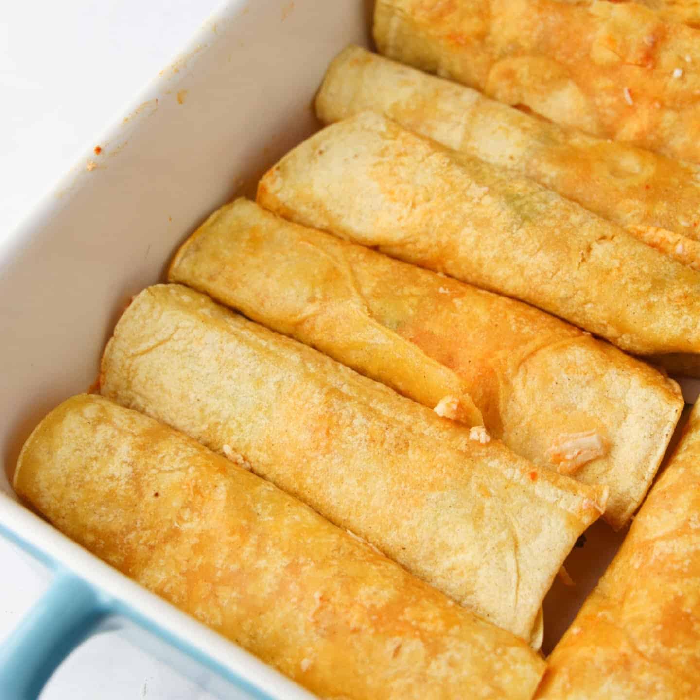 enchiladas roll in a casserole