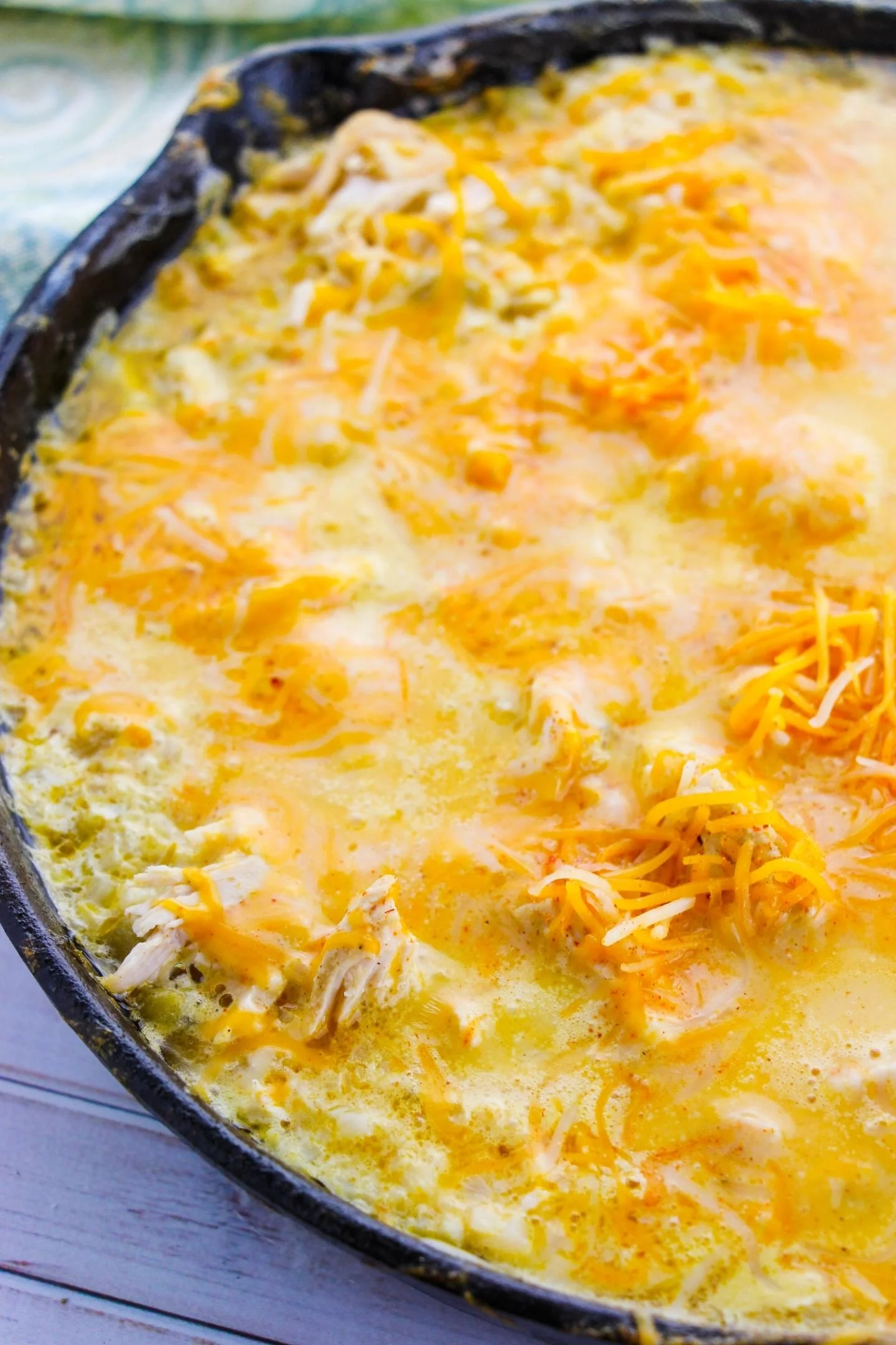 sour cream chicken enchiladas in skillet