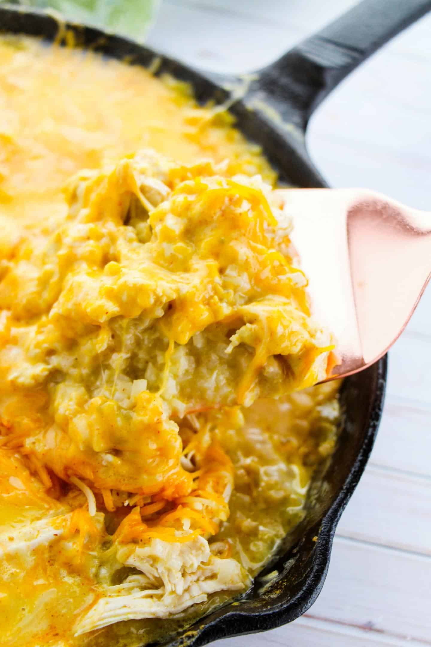 sour cream chicken enchiladas in skillet