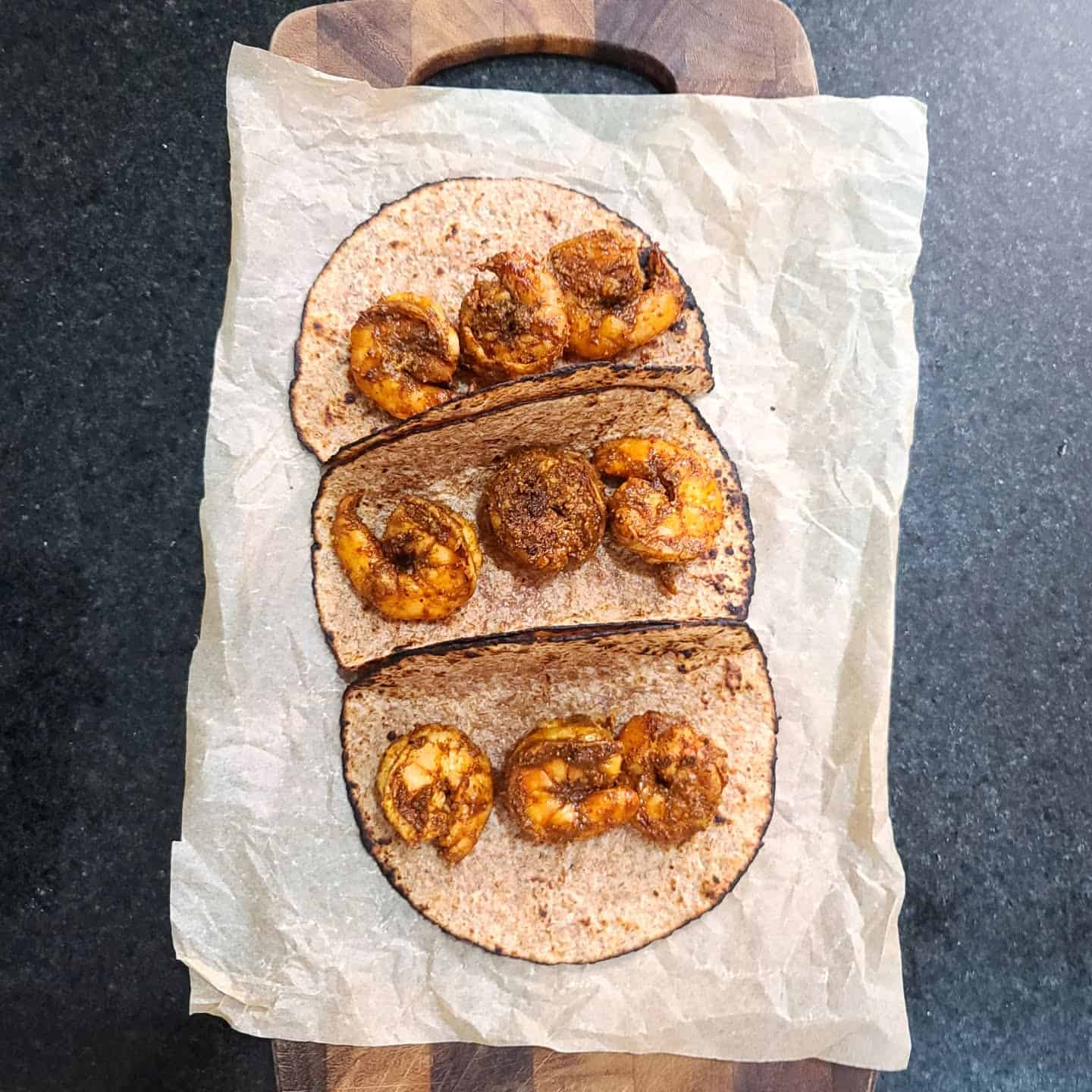 assembling tortillas with shrimp