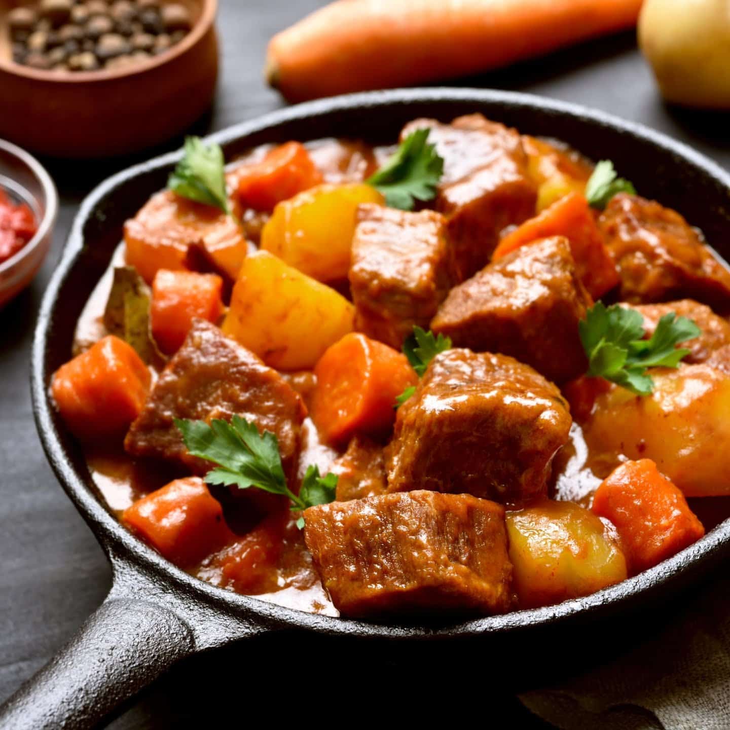 stew meat with vegetables in a pot