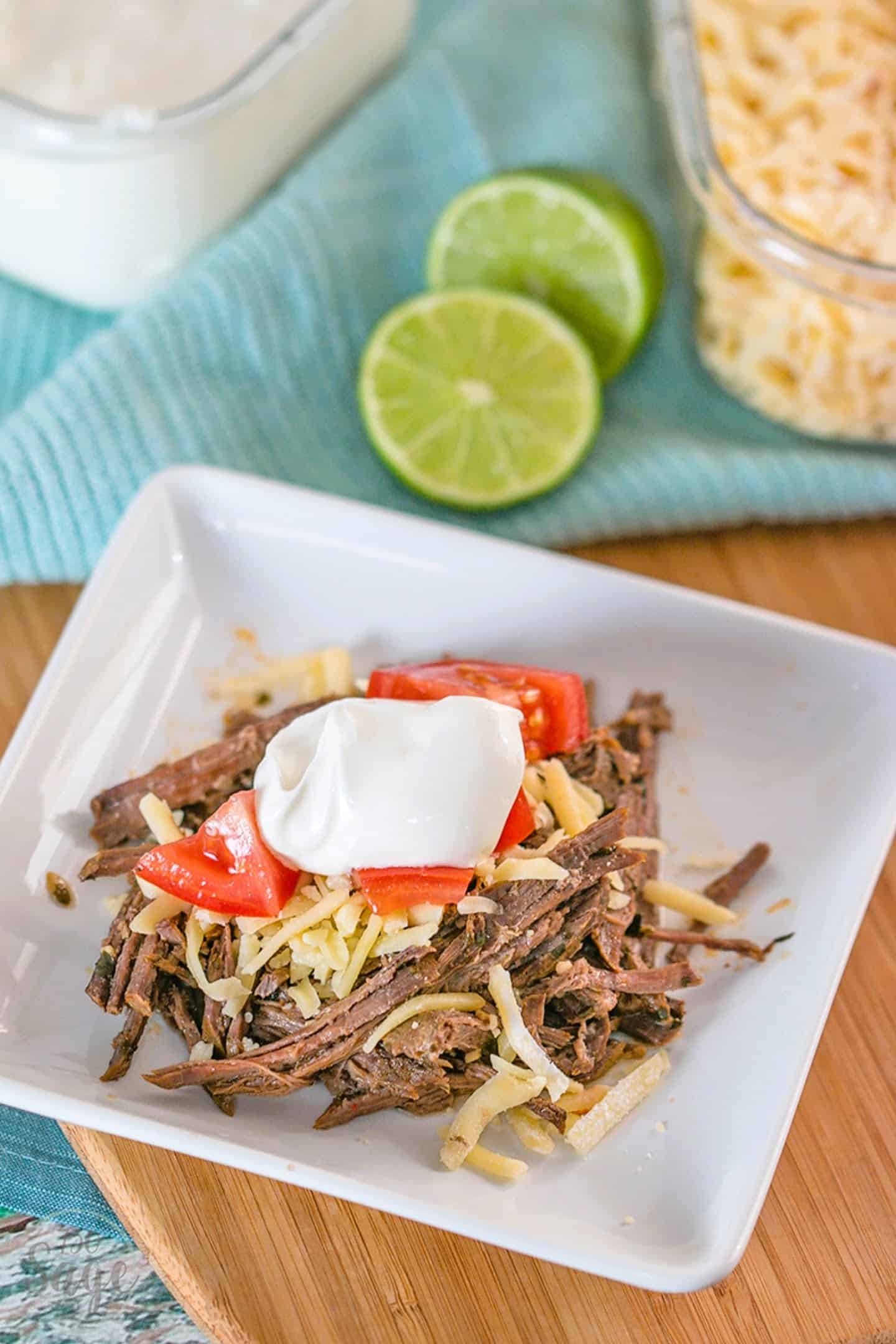  slow cooker Mexican shredded beef flavored with chili and lime.