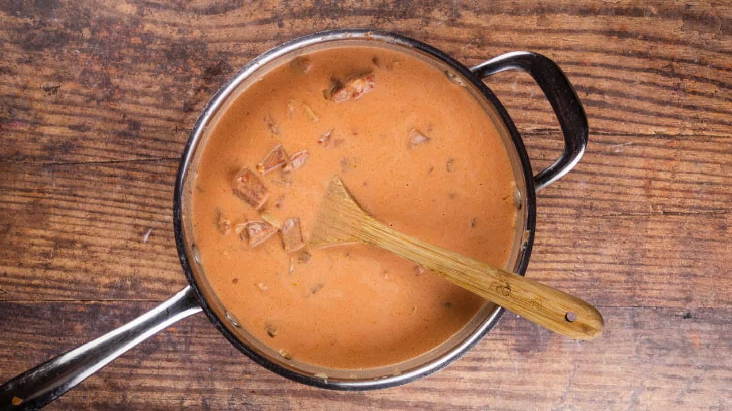 tomato paste, heavy cream, and chicken broth