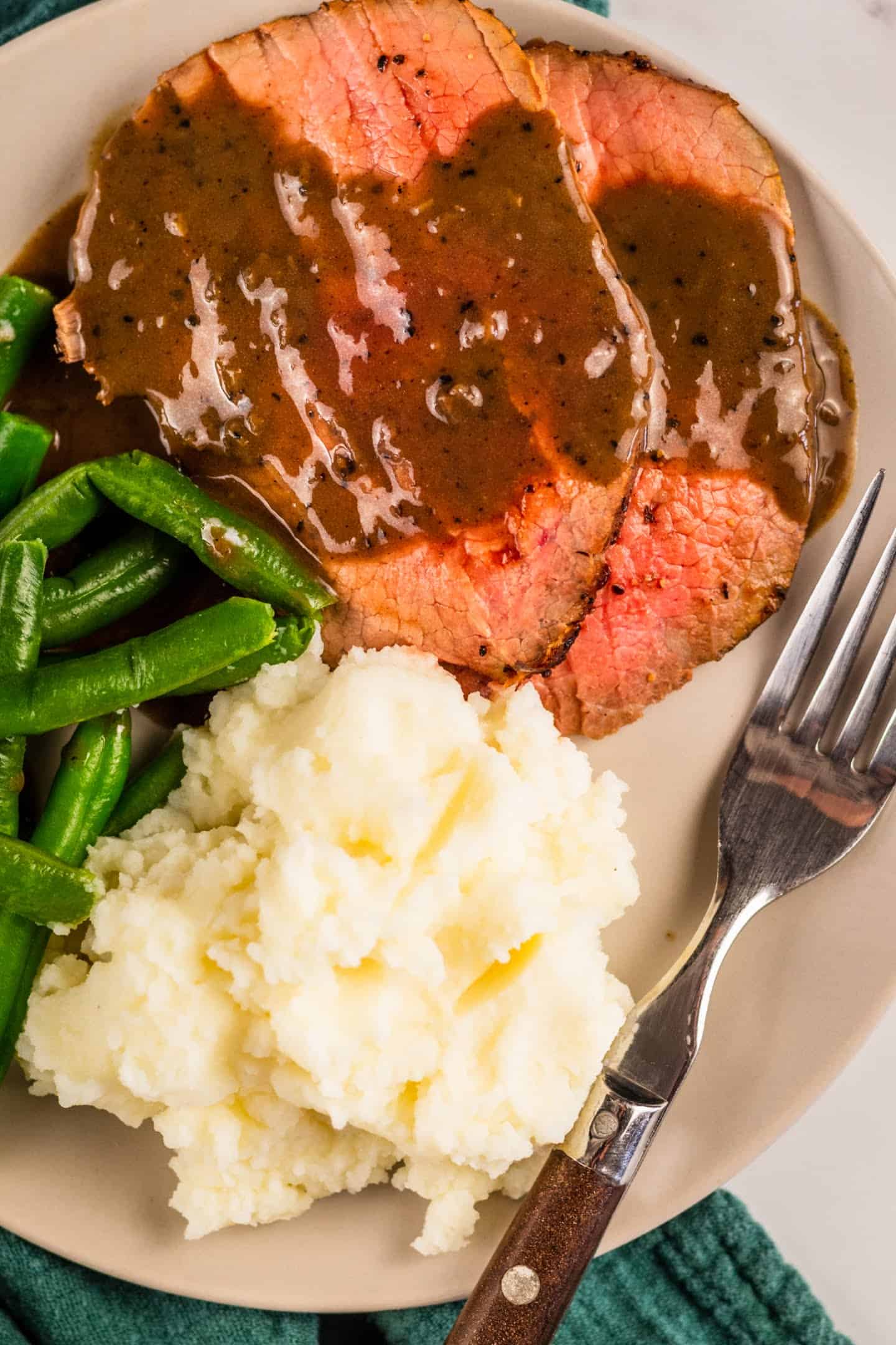 roast beef with mashed potatoes and green beans