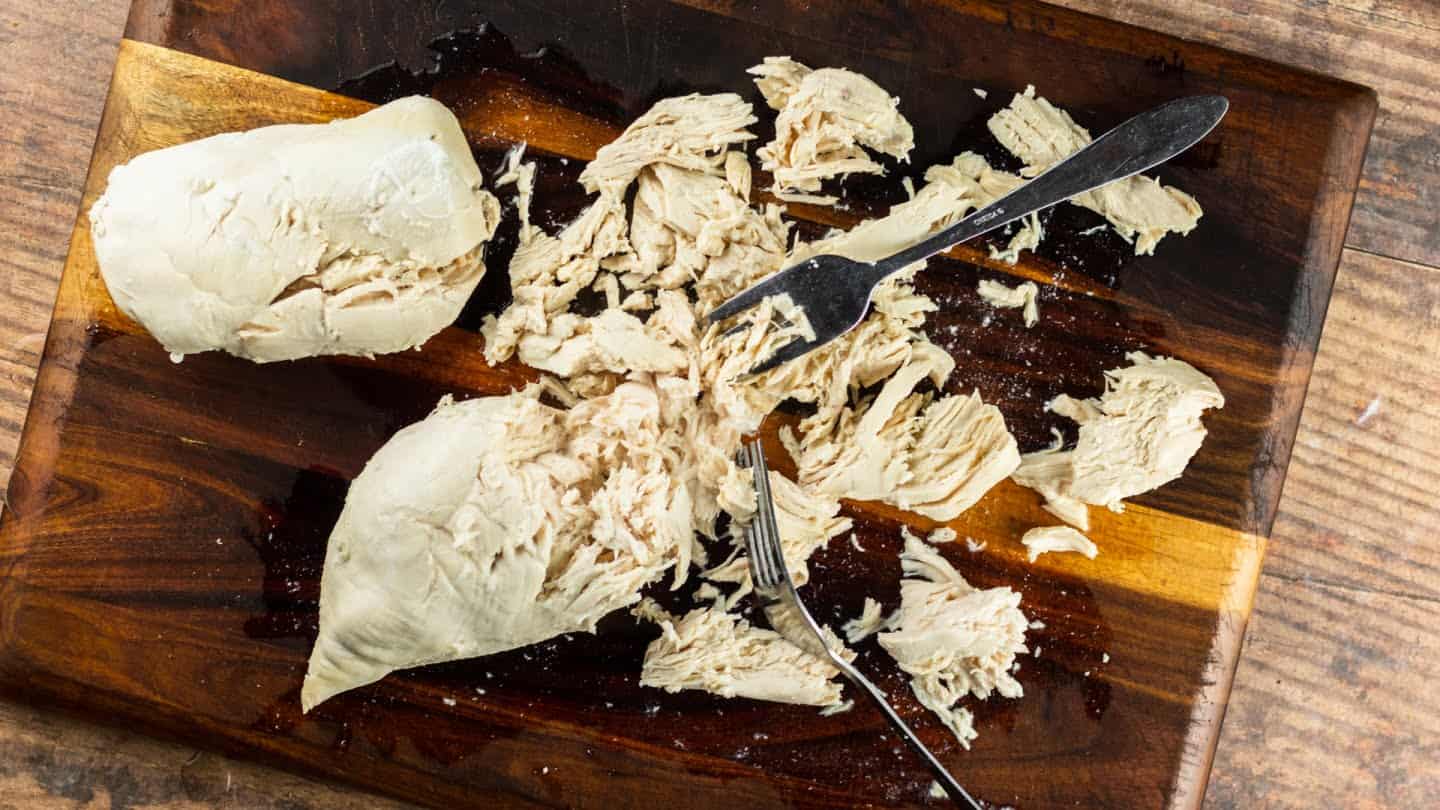 shredded chicken with forks