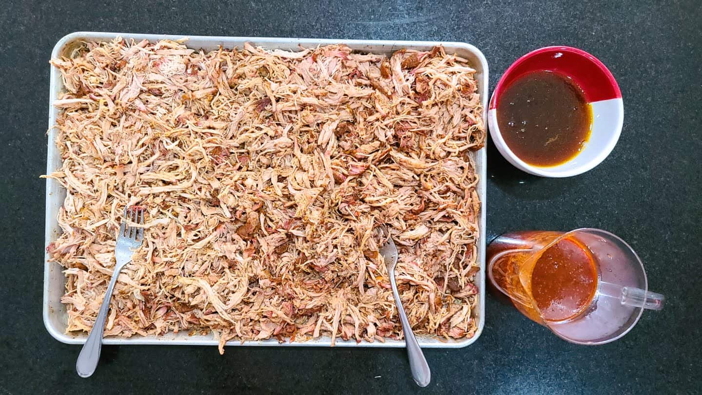 Mix the drained fat with 1 cup of homemade barbecue sauce. Distribute evenly over the pulled pork and combine.