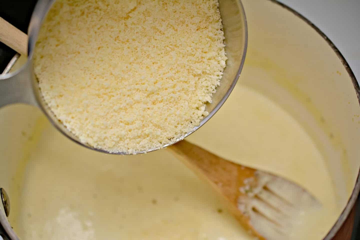 Parmesan Cheese into Heavy Cream