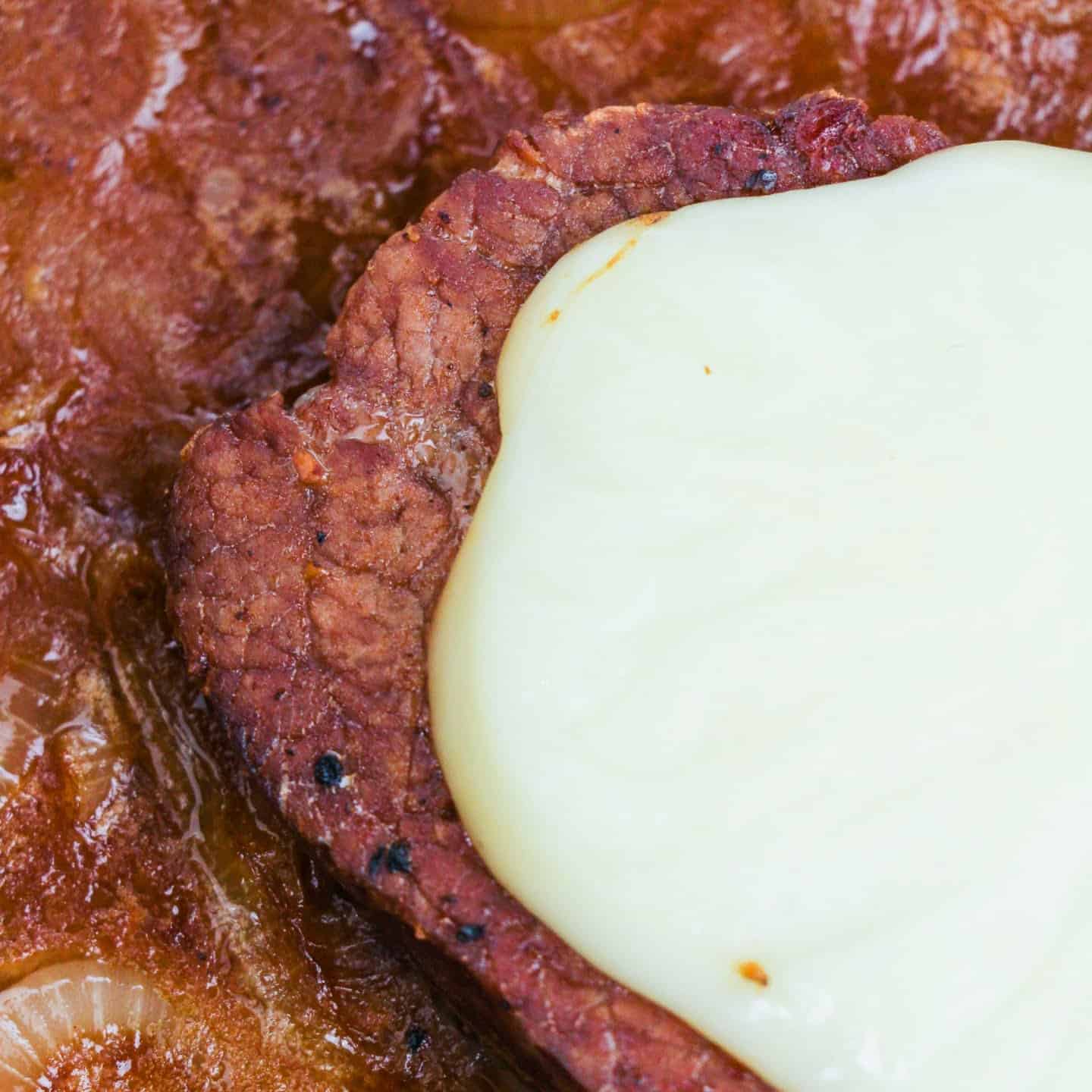 steak with mozzarella on top