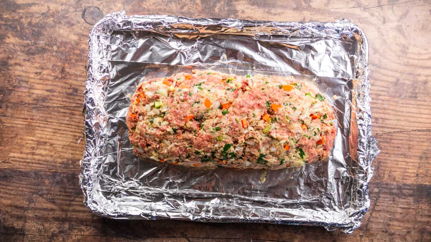 Shaped  meaty mixture onto the foil-lined baking dish