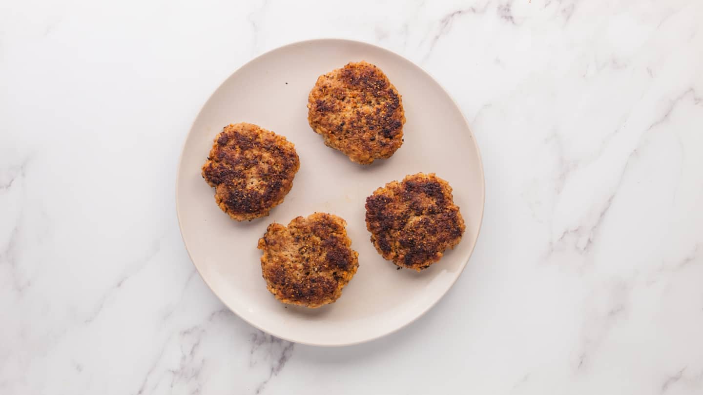 cooked sausage patties in a plate