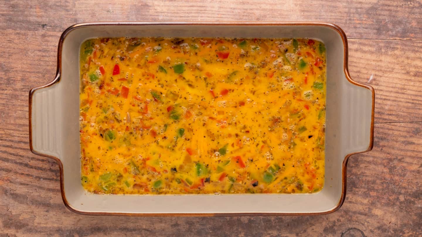 Pour the mixture into the prepared casserole dish and bake