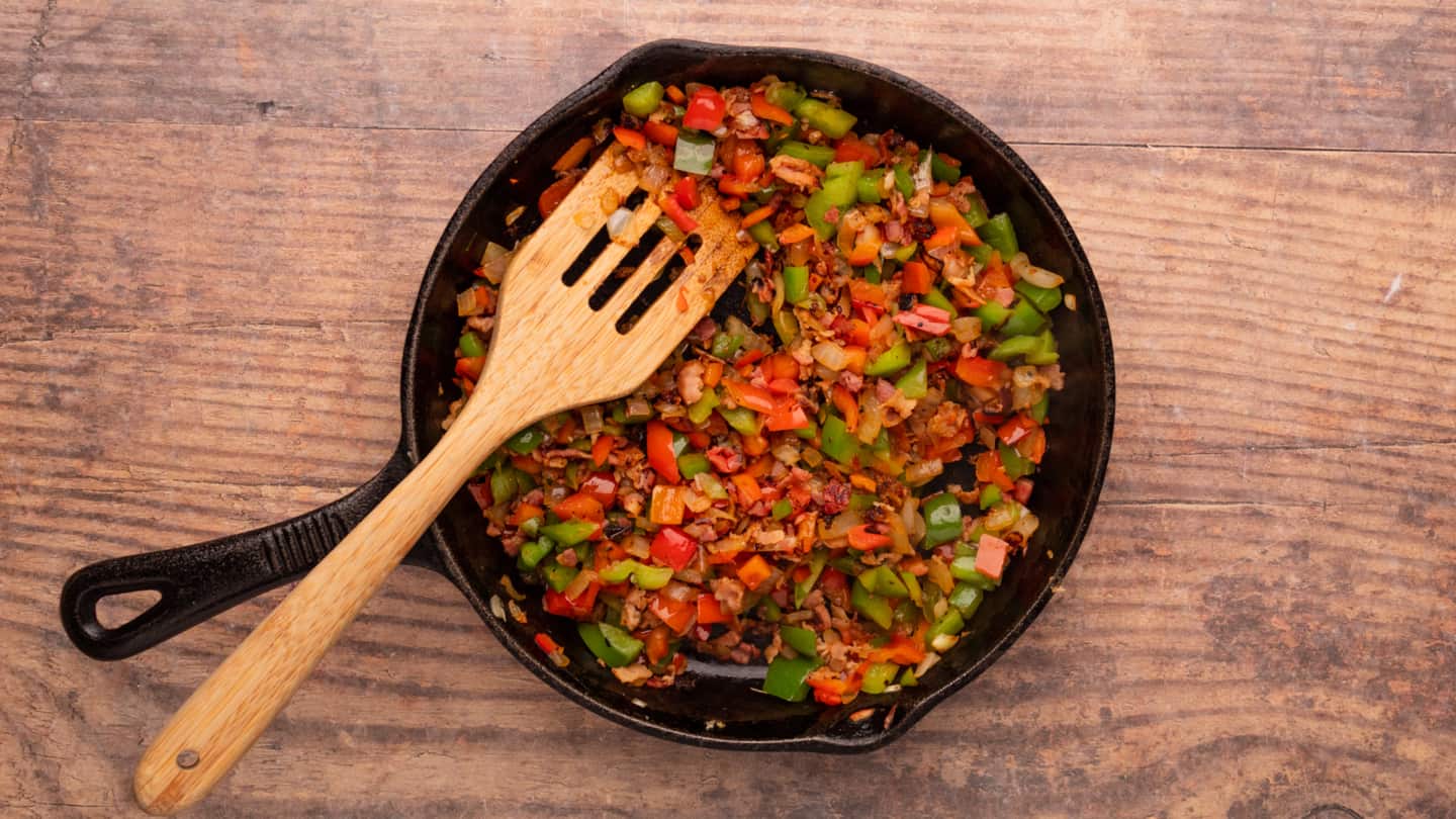 Add the chopped bell peppers to the skillet 