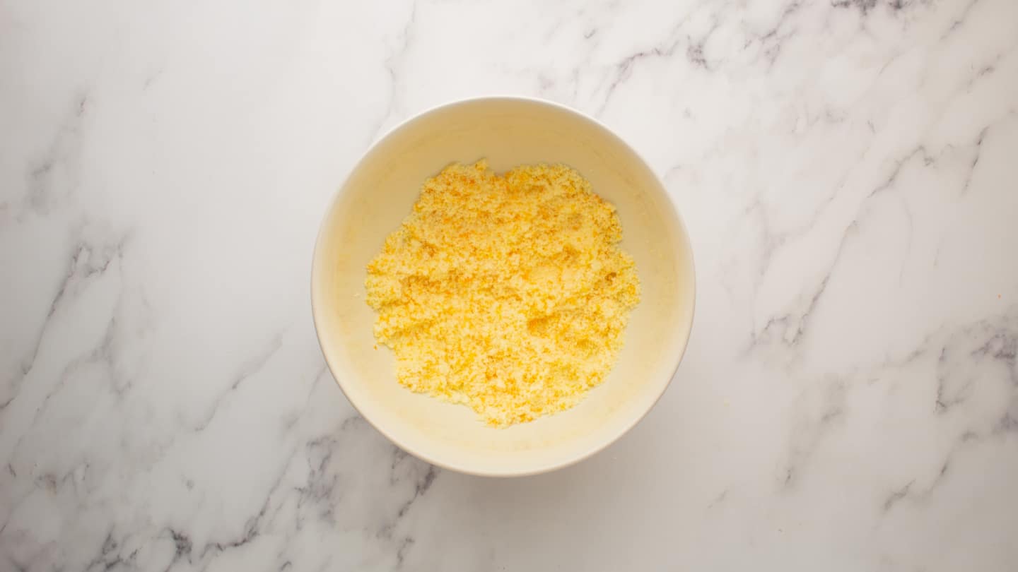 Mix the granulated sugar with the orange zest in a large bowl