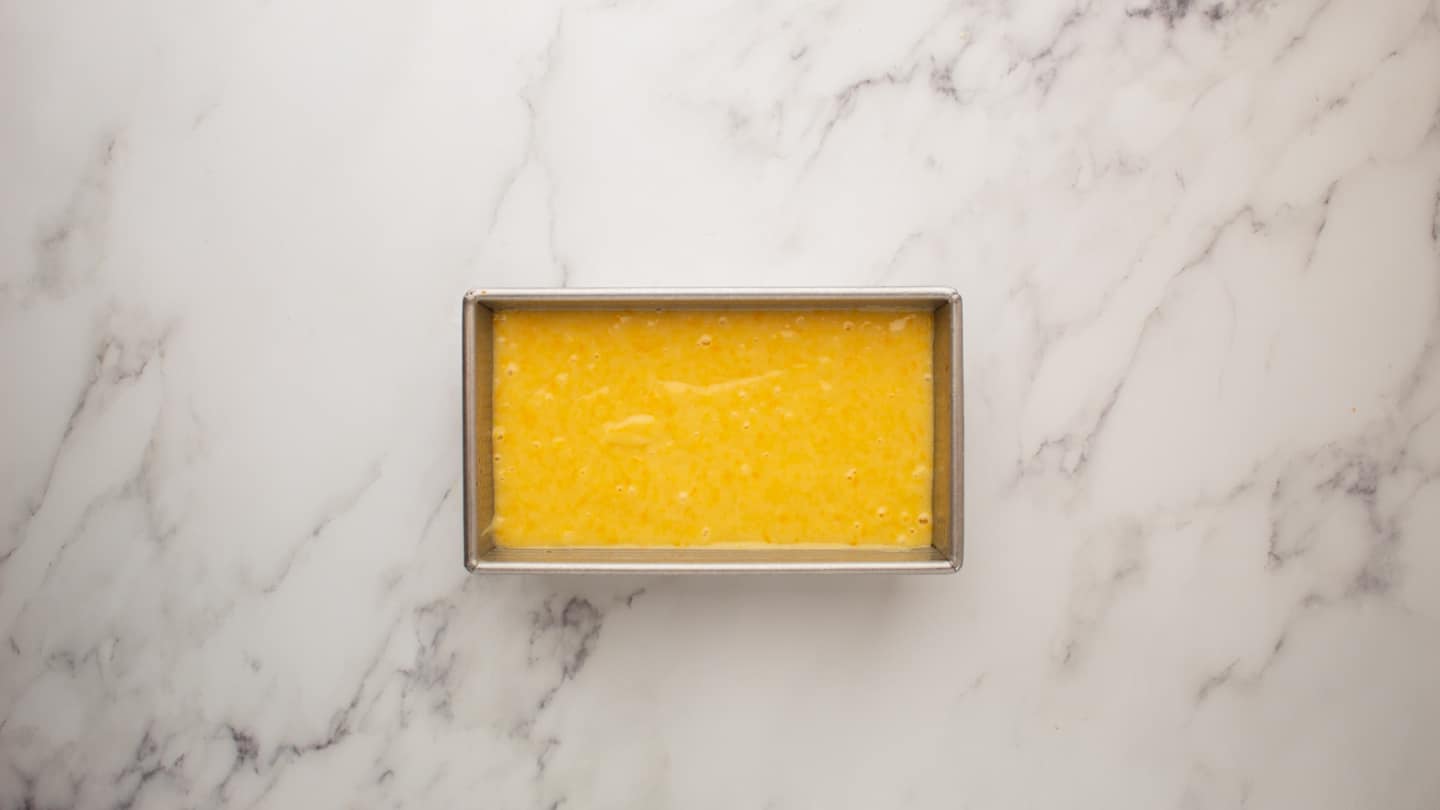 Pour the batter into the prepared cake pan and bake