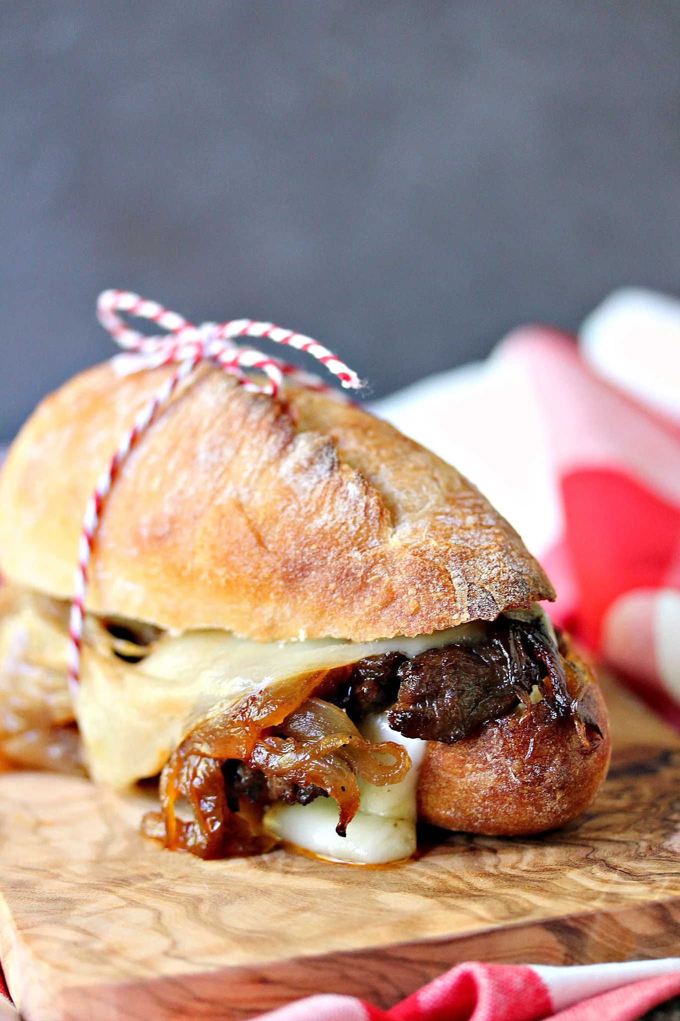 STEAK SANDWICHES WITH CARAMELIZED ONIONS AND PROVOLONE CHEESE
